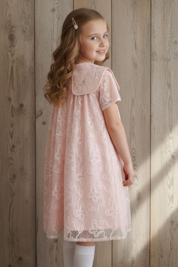 صورة فستان لحمي تل وفينكه منتهيه بالؤلؤ